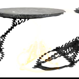 French Art Deco Lions Marble and Iron Accent Table: A French designer mixed media accent table. Marble and wrought iron. Moderne style wrought iron base with scrolling openwork panels depicting side facing Art Deco lions over a flat hoop base frame and