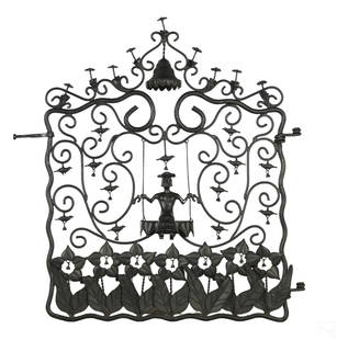 MacKenzie Childs Mrs Powers Cast Iron Garden Gate: A designer MacKenzie Childs Mrs. Powers Garden Gate. Produced in forged iron with black finish. Unusual scrolling design with a profusion of bell forms, and featuring a central stylized female figure