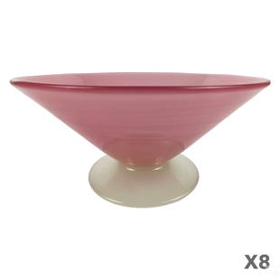 Steuben Pink Rosaline Glass Footed Bowls 8pc. SET: A set of eight (8) vintage Steuben American art glass footed bowls. Mid Century Modern designs with opalescent pink triangular form glass bowls surmounting white opaque bases. Each with etched STEUBEN