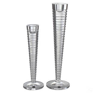 Steuben Crystal Pair Evening Candlesticks SIGNED: An estate collection featuring two (2) Steuben crystal candlestick holders, produced in the Evening pattern. Modernist designs with ribbed clear glass bodies that taper from narrow bottom to thick sum