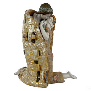 Lladro Porcelain THE KISS Sculpture after G. Klimt: A Lladro Spanish porcelain figurine. Titled, "The Kiss." Inspired by the original circa 1908 painting, the most famous work of the Viennese Secessionist painter, Gustav Klimt (1862-1918), and produced