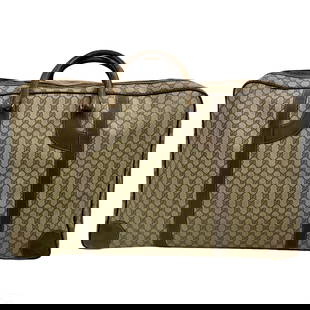 Gucci Italian Designer Travel Luggage Suitcase Bag: A vintage Gucci Italian designer suitcase bag. Large nylon fabric body with leather details and handles, and zippered top opening to a generous interior space. Manufacturer GG logo repeated across ext