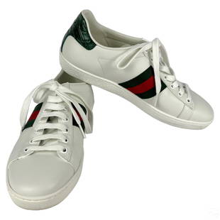 Gucci Italian Leather Ace Low Top Sneakers Sz 38: A pair of Gucci Italian leather low top sneakers. Crafted from leather, with nylon web accents and having green crocodile leather detail at back, rubber sole. Made in Italy. Marked size 38 (European).