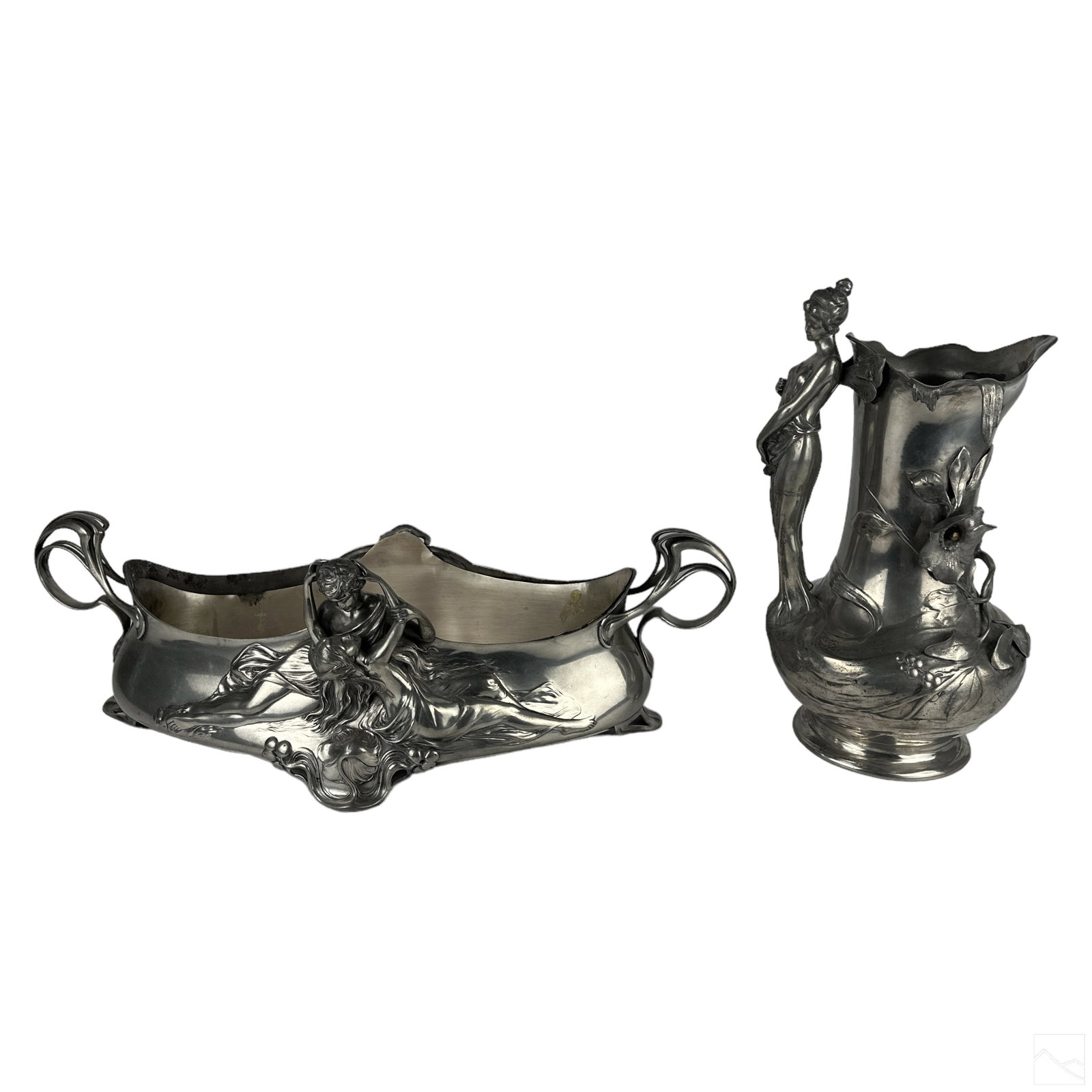 Art Nouveau Silverplate Figural Centerpiece & Vase: Two (2) antique Art Nouveau silver plated pieces. Includes: one (1) German WMF Wurttembergische Metallwarenfabrik silver plate vase, featuring a nude fairy handle and applied dogwood flower foliate mo