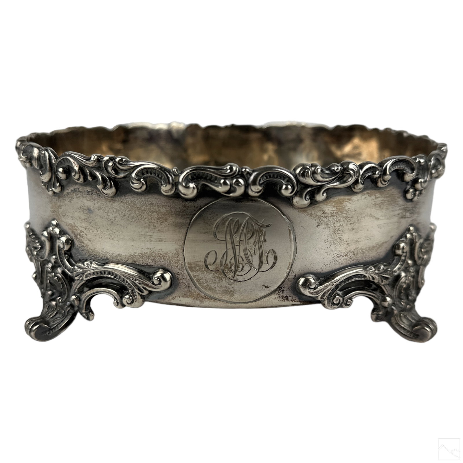 Rand & Crane 925 Silver Wine Bottle Coaster 440g.: A vintage Rand and Crane sterling silver footed oversized champagne wine bottle coaster holder. Features an ornate baroque detailed trim design, bearing monogram at front center. Marked STERLING with