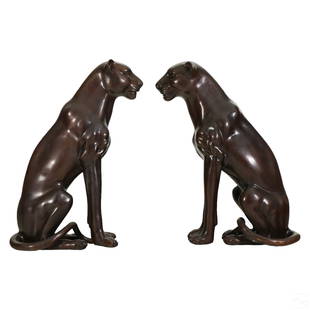 Bronze Pair of Life Size Panther Cat Sculptures: A matched pair of Art Deco stylized bronze big cat statues. Two Moderne contemporary cast works featuring upright seated panthers and or jaguars. No apparent signatures or makers mark. Dimensions: 35