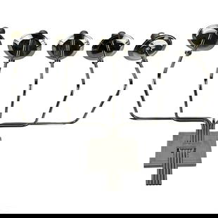 Tommi Parzinger Style Modernist Chrome Candelabra: A five arm chrome metal candelabra produced circa 1950s in the style of Tommi Parzinger (1903-1981) for Dorlyn Silversmiths. Mid Century Modern design with extendable arms mounted on a rectangular bac