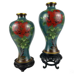 Chinese Cloisonne Champleve Enameled Amphora Vases: A pair of Chinese cloisonne vases. Stylish amphora form bodies with trumpet rims, enamel scrolling and botanical decorations and delicate gilt cloisonne champleve designs throughout. No apparent signa