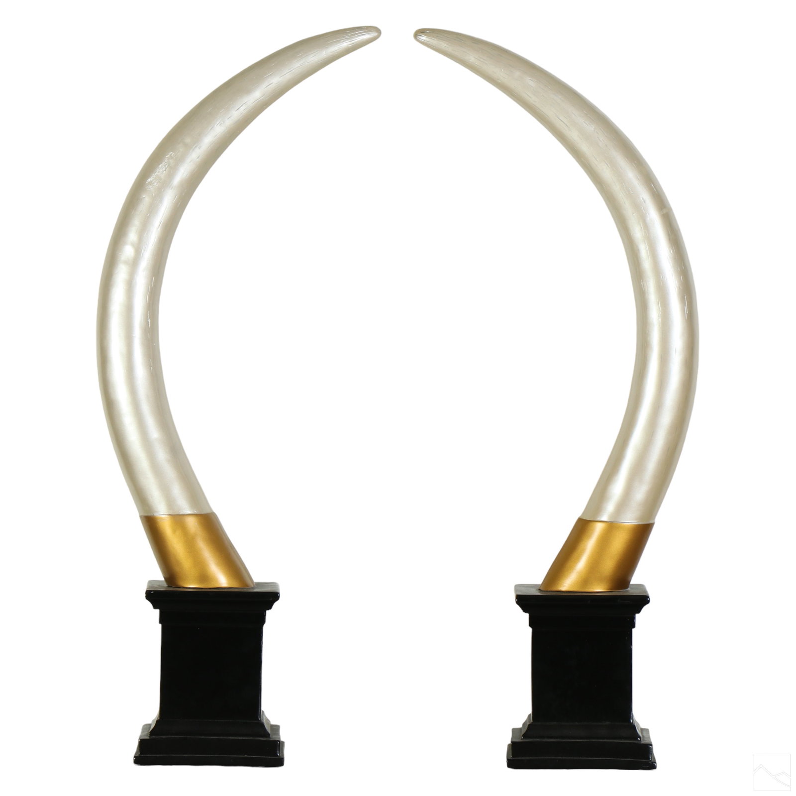 Hollywood Regency Large Pair Faux Elephant Tusks: A matched pair of Hollywood Regency style decorative replica big game trophy tusks. Features a pearlescent cast composition tusk forms, surmounting large painted plinth base stands. No apparent makers