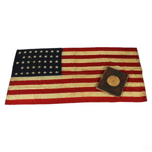 American Antique 38 Star Flag & US Presidents Book: A historical patriotic Americana estate lot, featuring an antique U.S. flag and book. Includes: one (1) antique fabric United States Navy USN style ship's ensign flag, presenting 38 stars to blue