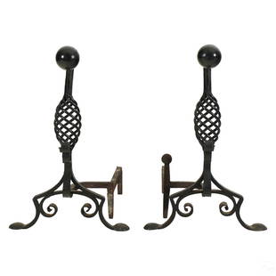 Arts & Crafts Wrought Iron Fireplace Andirons SET: A pair of Arts & Crafts black wrought iron fireplace andirons. Featuring twist, turns and bends by a master blacksmith. No apparent makers mark.. Dimensions: 26 X 27 X 16 in. Condition: Good over