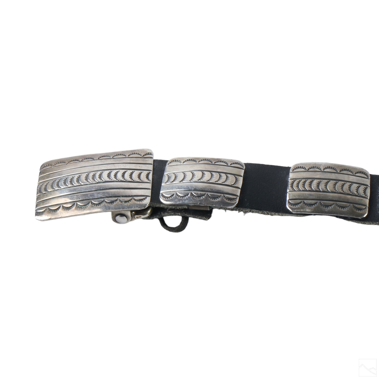 Native America Navajo Sterling Silver Concho Belt: A vintage Native American Navajo Indian old pawn sterling silver concho belt. Features a handcrafted black leather belt with twenty (20) oblong conchos. The concho tiles measure .50" x 1" x .10. Sterl