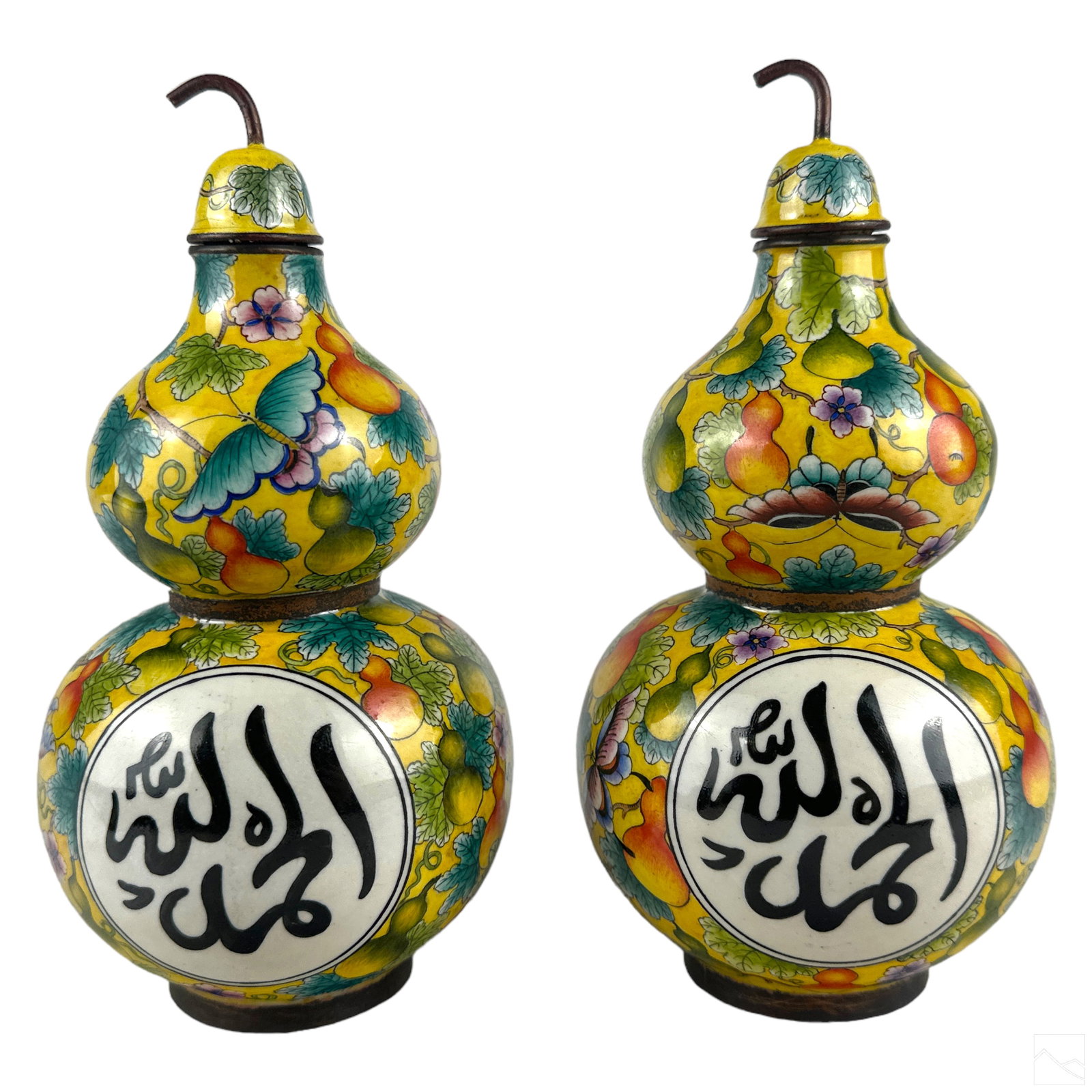 Chinese Export Pair of Islamic Cloisonne Decanters: A pair of Chinese export cloisonne gourd and or pair shaped oil and or perfume bottles with corked tops, crafted for the Islamic market. Featuring a yellow fruit vine, flower and butterfly ground, wit