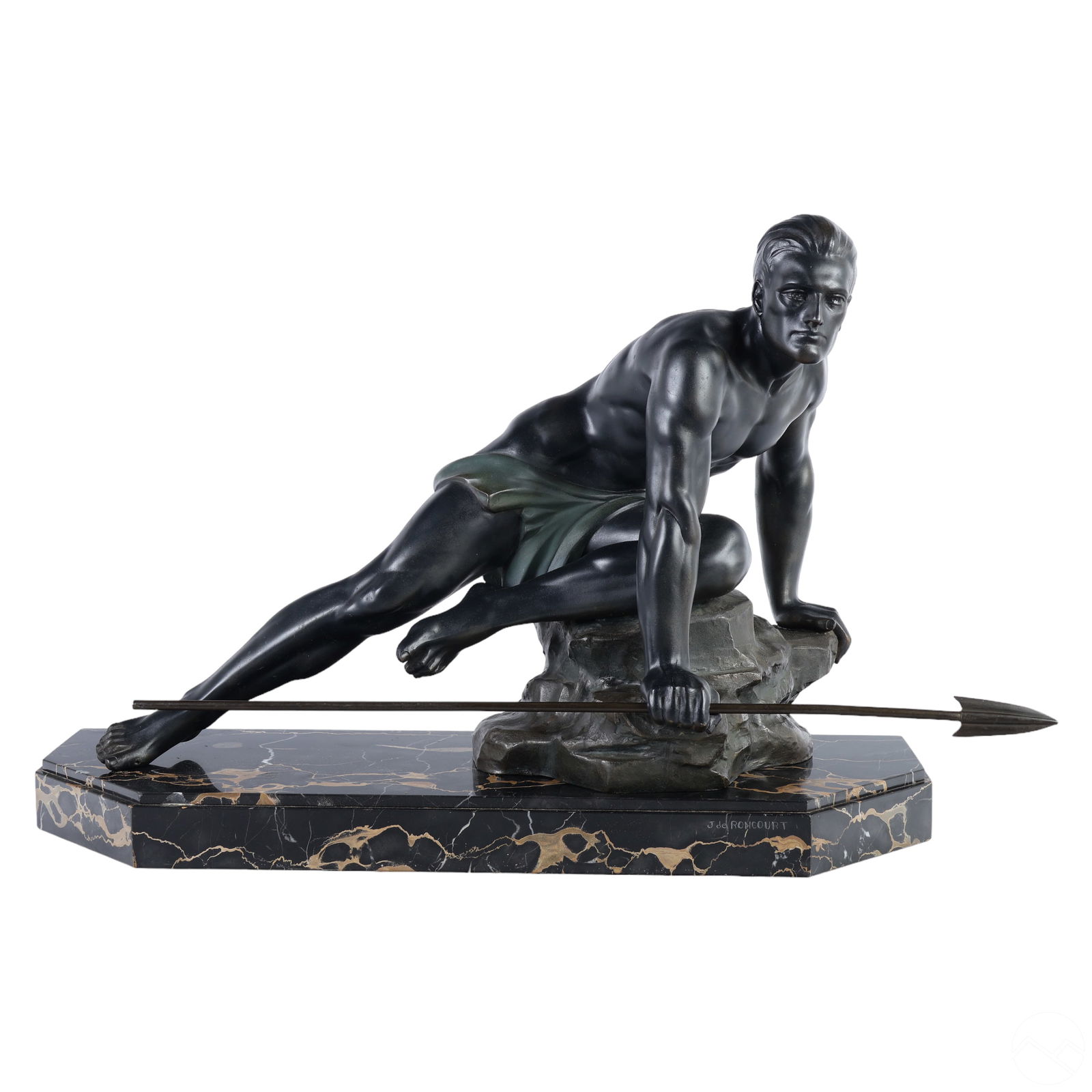 Bronzed Metal Hunter Statue after Jean de Roncourt: A patinated French bronzed metal sculpture after Jean de Roncourt (19th/20th Century). Titled, "Sur La Piste." A figural Art Deco work features a kneeling male hunter figure on a landscape form base,