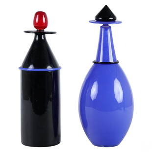 Murano Lino Tagliapietra Venetian Glass Decanters: Two (2) Murano Italian studio art glass decanters with stoppers. Postmodernist works with playful abstract designs. Includes: one (1) limited edition black glass decanter with blue applied horizontal