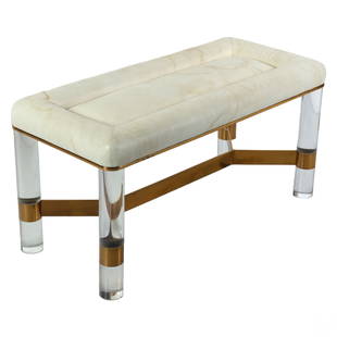 Karl Springer Modern Brass Lucite & Leather Bench: A Karl Springer designer leather bench. A rectangular form with a plush leather upholstered top surmounting a quartet of a cylindrical clear acrylic legs supported by a polished brass center mount. Im