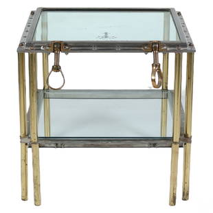 USS Topeka Recycled Naval Ships Widow Side Table: An maritime marine naval vessel salvaged porthole window accent side table. Glass with polished brass and other metals mounted into a rectangular industrial form. Table is supported by four cylindrica