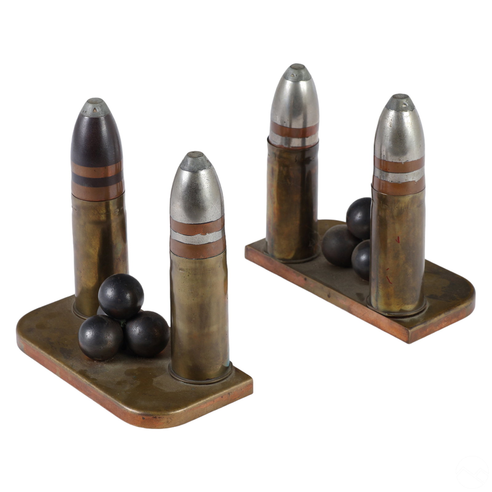 Arts & Crafts Metal Trench Art Ammunition Bookends: A vintage pair of artisan made mixed metals trench art style bookends. Hand crafted using old empty artillery shell casings and various metal components, featuring substantial bases. No apparent maker