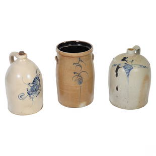 Saltglaze Stoneware Jug and Crock Vessel 3pc LOT: An estate lot of three (3) antique pottery vessels. Decorated with cobalt blue hand decorated scrolling floral designs to exterior. Includes: two (2) jug form vessels with looping handles, and one (1)