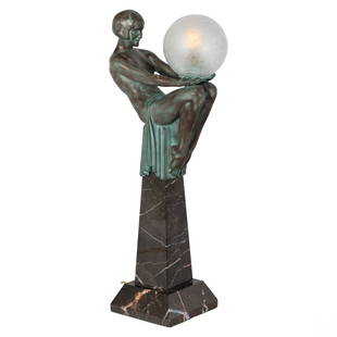 Max Le Verrier 1891-1973 Bronze Art Deco Lady Lamp: Max Le Verrier (France, 1891-1973). Bronze Art Deco "Enigme" table lamp. Depicts lady crouching atop black marble column. She holds crackle glass globe in her hands. Single light source under glass. S