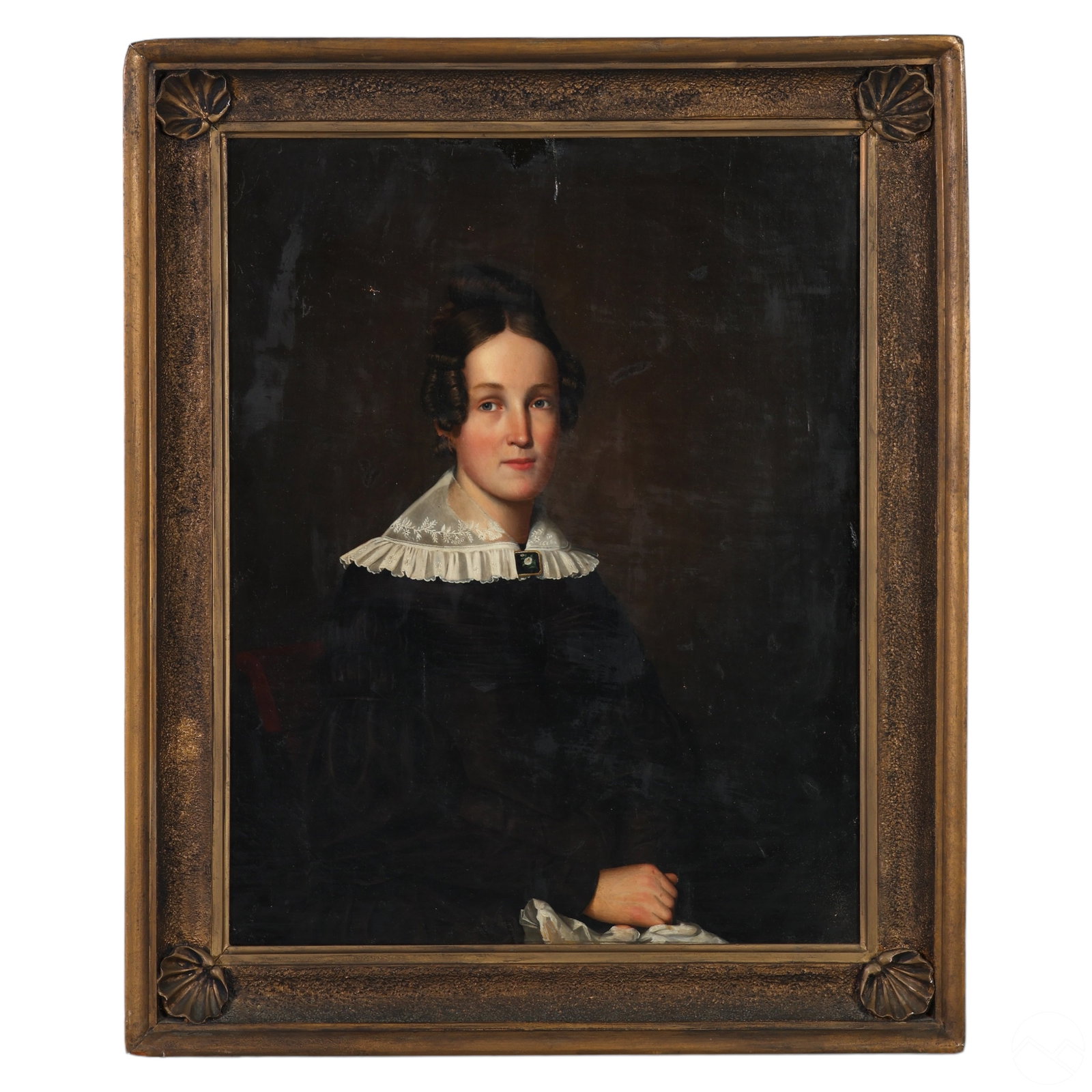 American School 19C. Antique Portrait Oil Painting: An antique oil painting on canvas. A portrait produced in the style of the early to mid 19th Century American School depicting a matronly female figure wearing a black dress with lace collar. No appar