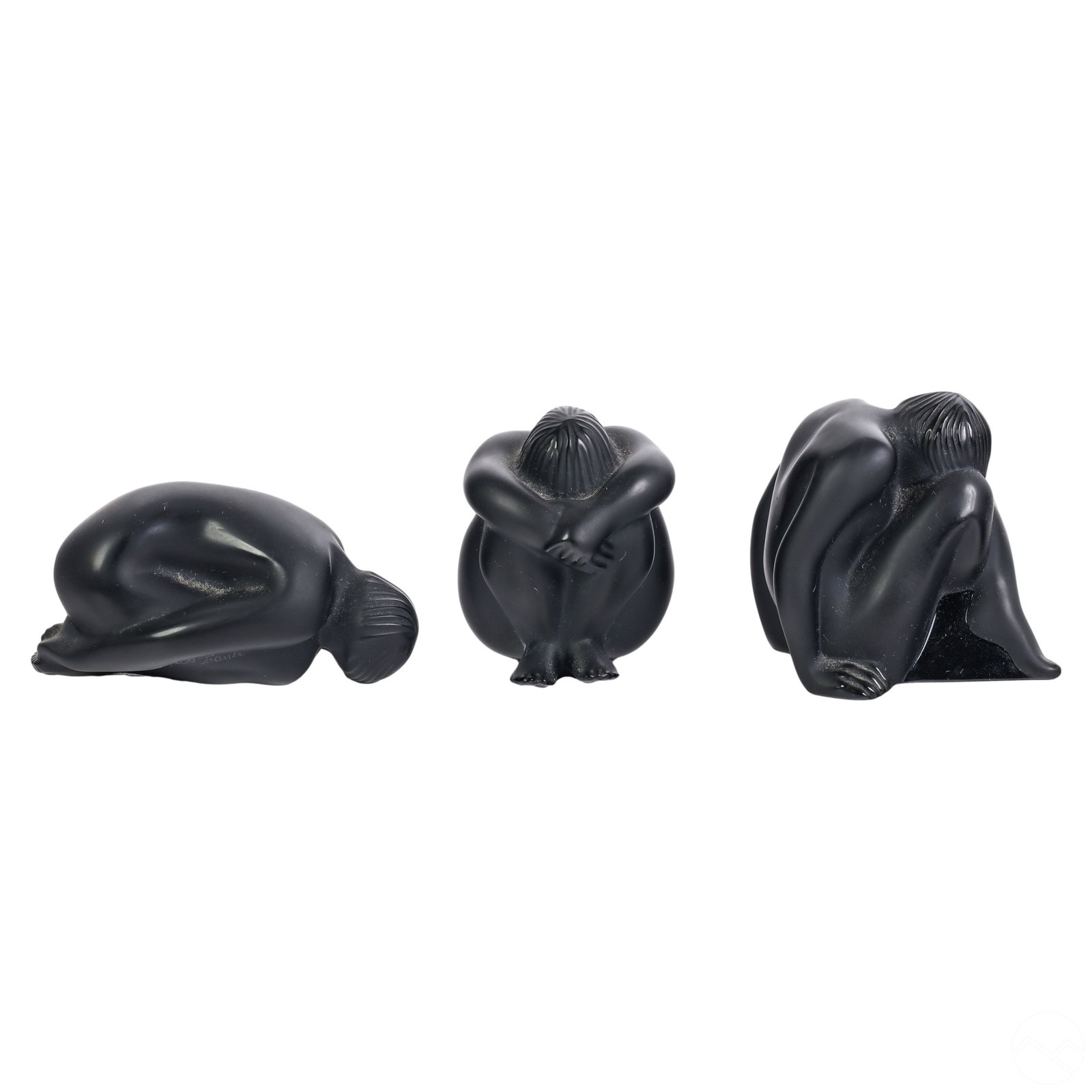Lalique Crystal Nahbi Noir Meditating Nude Figures: A trio set of Lalique French crystal Nahbi nude art deco style females. The figurines are meticulously crafted from fine black art glass crystal with a satin finish. Each sculpture portrays a distinct