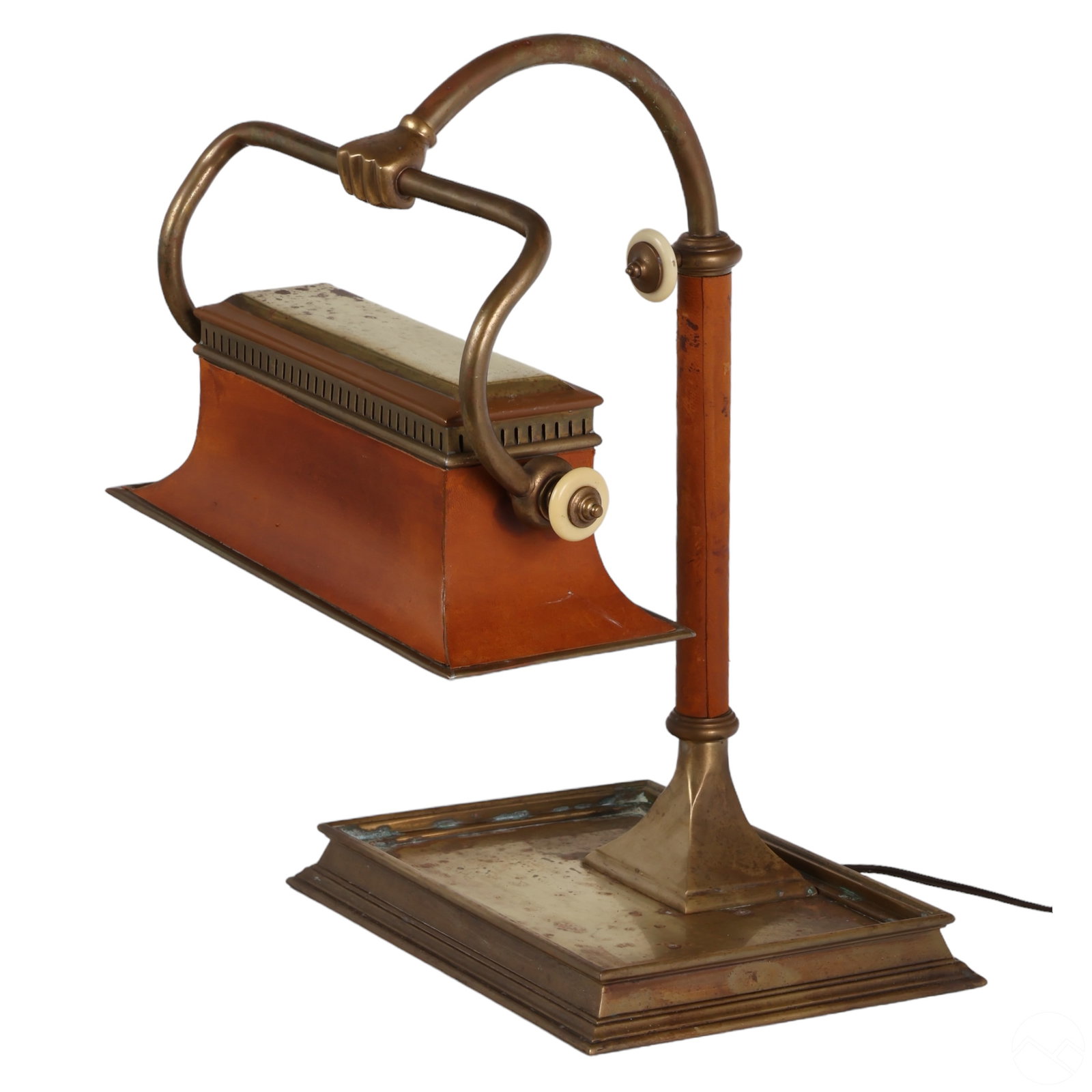 Chapman Brass & Leather Bankers Hand Desk Lamp: A Chapman solid brass banker's "hand" library desk lamp featuring a hand-holding design, mounted on a heavy brass plinth. The lamp rises on a curved leather-wrapped pole to the light source, and the a