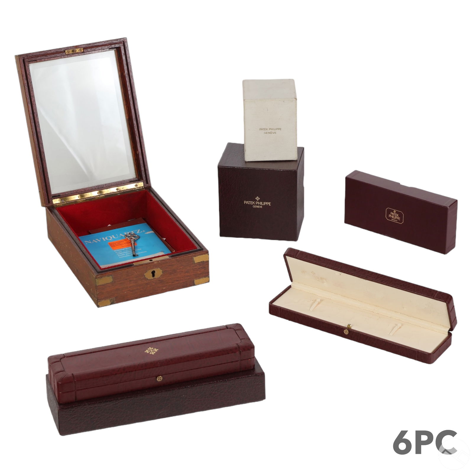 Patek Philippe Wood Watch Presentation Box 6pc LOT: An estate lot of six Patek Philippe wristwatch display boxes and outer storage box covers. Includes (2) hinged burgundy leather watch boxes, one with the original protective outer box cover, (1) Patek