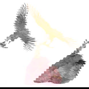 Asprey of London 18K Gold and Diamonds Falcon Bird Sculpture: A stunning wild falcon sculpture by Asprey & Co. of London, circa 1970, depicting a majestic "Bird of Prey" in mid-flight. The falcon is crafted in 18k yellow and white gold and perched on a natural