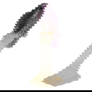 Peter Muller (b.1952) Amethyst Falcon Bird of Prey Sculpture on Crystal Base: A Wild Falcon Sculpture by Brazilian stone artist Peter Muller (born 1952). This exquisite bird is carved from natural amethyst, showcasing intricate feather details on its body, wings, and tail. The