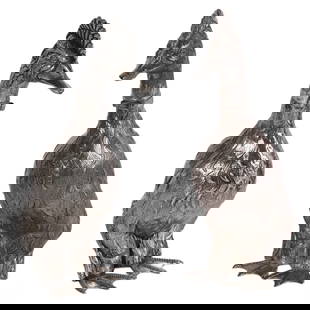 Silver Pair of Duck with a Bow Tie Decanters 360g.: A charming pair of silver duck-shaped vessel decanters, each featuring intricate detailing and adorned with a bow tie. These whimsical decanters showcase fine craftsmanship, with the texture of the