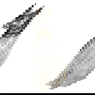 Silver Plate and Clear Glass Guard Dog Decanter: An antique silverplate and clear glass figural decanter in the shape of a seated guard dog, resembling a Doberman or German Shepherd. The body is made of clear glass, capturing the form of a sitting