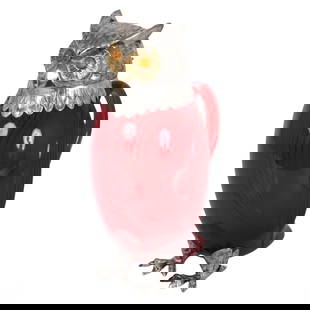 Spanish Sterling Silver & Ruby Glass Owl Decanter: This exquisite owl-shaped decanter features a vibrant ruby-colored glass body, complemented by sterling silver accents. The owl’s head is intricately crafted in sterling silver, with a gold-washed