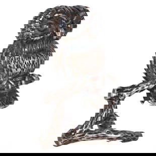 Cartier French Sterling Silver Model of a Perched Owl Figurine 30g.: A beautifully crafted Cartier sterling silver owl figurine, perched on a branch. The owl is intricately detailed, showcasing the fine craftsmanship synonymous with Cartier's designs. The figurine is