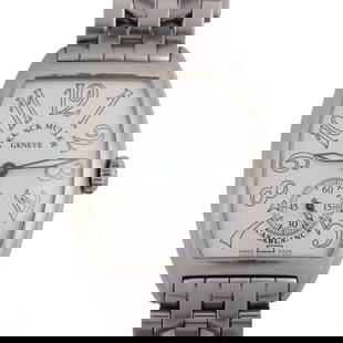 Franck Muller Casablanca Watch with Secondary Dial: This Franck Muller Casablanca wristwatch, crafted from stainless steel, showcases the brand's iconic tonneau-shaped case. The dial features oversized Arabic numerals, which contrast beautifully agains