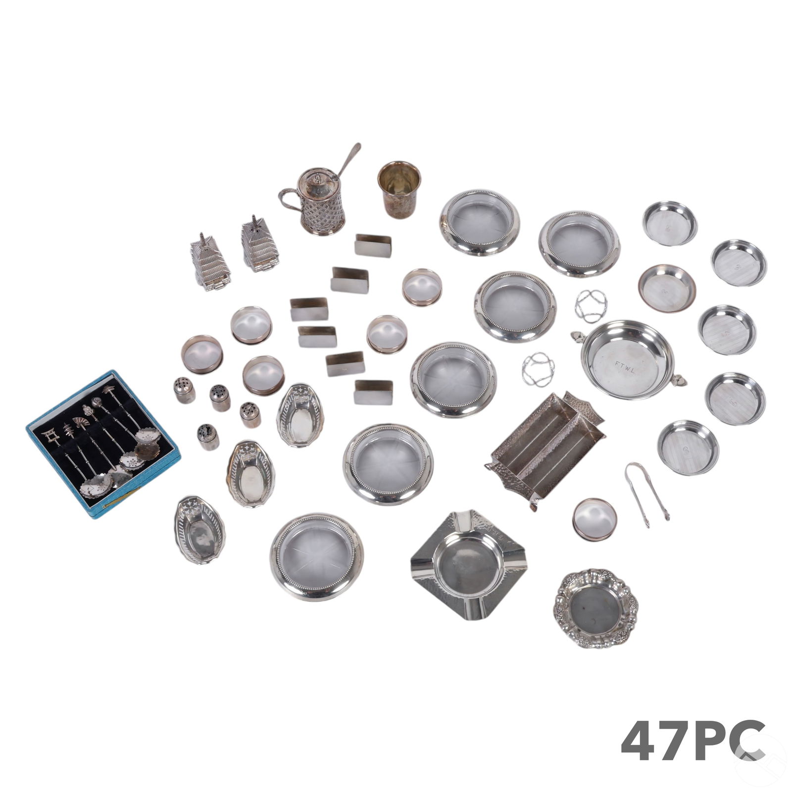 Sterling Silver Table Accessories ESTATE LOT 790g.: Estate lot of sterling silver table accessories, offering a diverse collection. This lot includes six monogrammed napkin holders, six monogrammed butter pats, two ashtrays, three nut dishes, a 3.5-inc