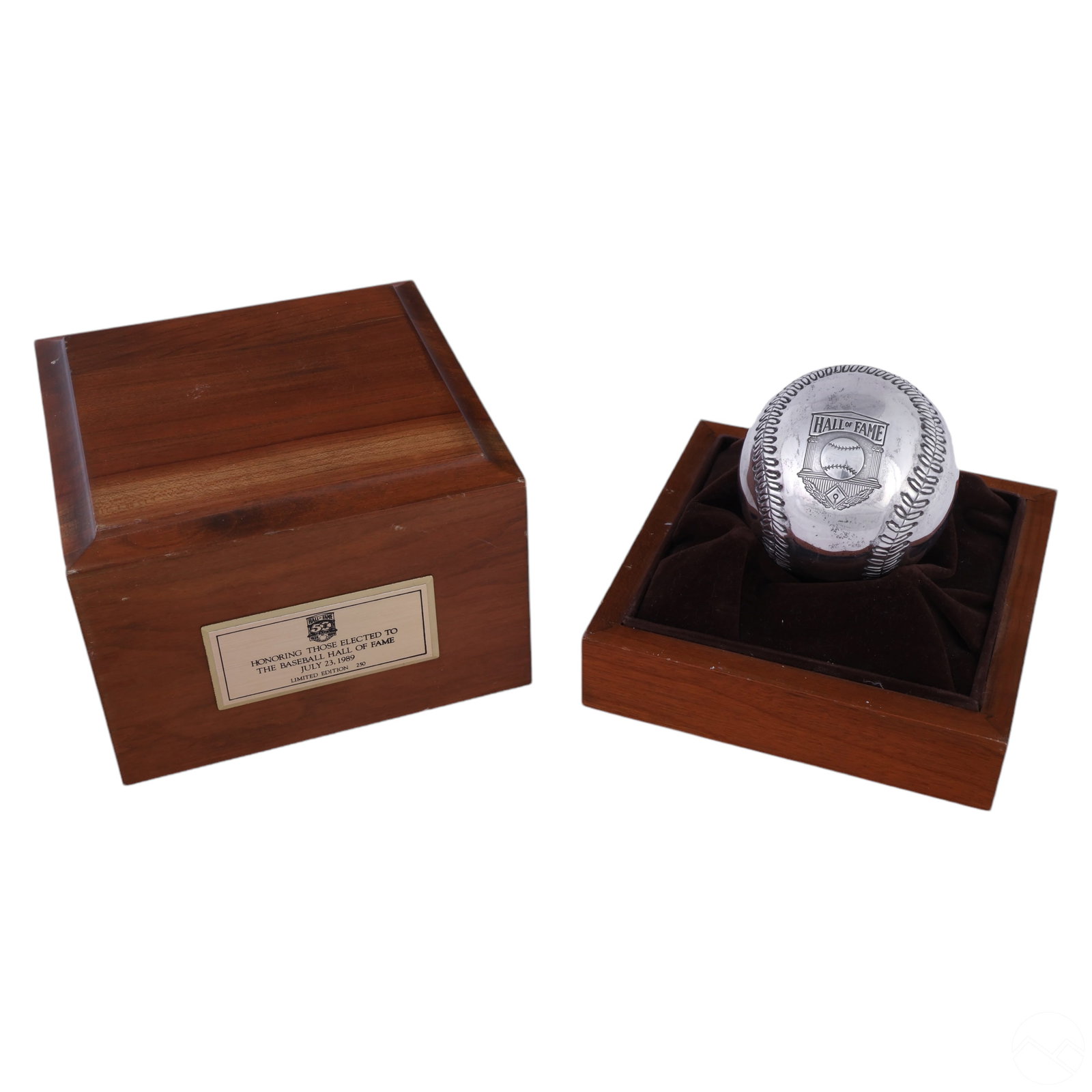 Sterling Silver Hall of Fame Museum Mini Baseball: Sterling silver Hall of Fame commemorative baseball featuring detailed stitching and a raised "Hall of Fame" emblem, crafted as a tribute to baseball history. Stamped "STERLING" and "42-50" on the und