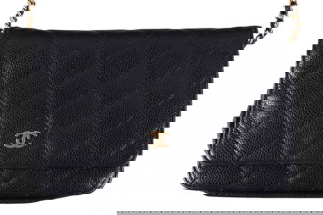 Chanel French Black Quilted Lambskin Purse w Chain: Chanel French designer black wallet bag on chain, featuring the iconic quilted pattern and a gold-tone CC logo accent. Designed with a leather-woven chain strap, offering versatile wear as a crossbody