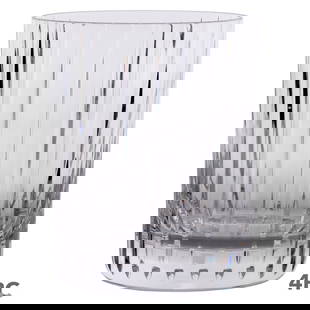 Baccarat Crystal Harmonie Old Fashioned Tumblers: Set of four Baccarat French crystal Double Old Fashioned barware glasses in the Harmonie pattern, introduced in 1975. Each glass features a sleek, modern design with vertical cuts encircling the body