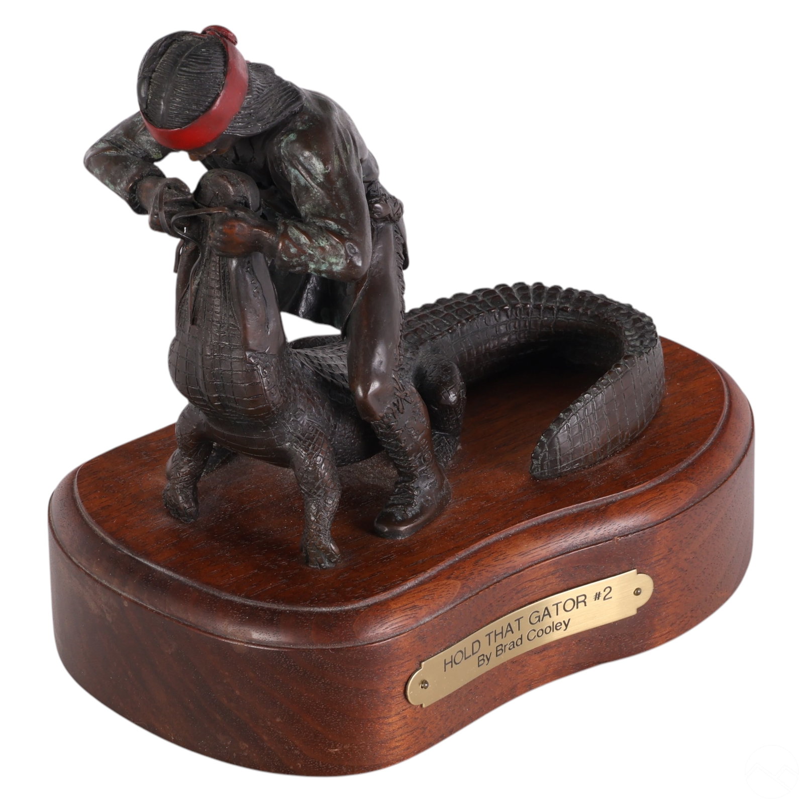 Brad Cooley b.1970 Bronze Gator Wrestler Sculpture: Brad Cooley (American, born 1970), limited edition patinated bronze sculpture titled Hold That Gator #2, depicting a Native American man wrestling an alligator. The figure is detailed with traditional