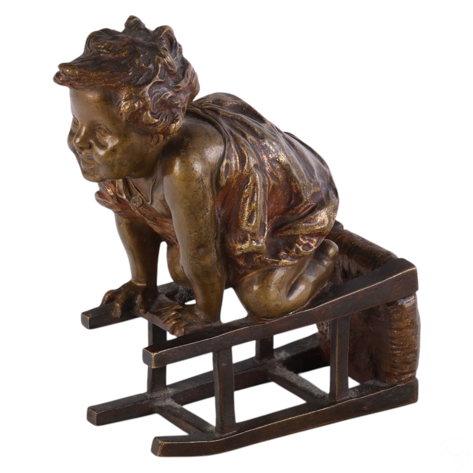 Juan Clara Ayats 1875-1958 Bronze Child Sculpture: Juan Clara Ayats (Spanish-American, 1875-1958), patinated bronze figural sculpture depicting a young toddler playfully balancing on an overturned stool or chair. The composition captures a moment of i