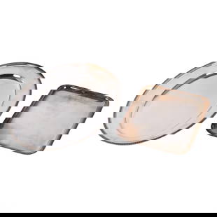 Christofle Silverplate Oval & Rectangular Tray LOT: Estate lot of two 20th-century Christofle France silver-plated serving platters, including one oval and one rectangular example. Both platters feature a high-polished finish accented by gadrooned and