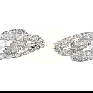 Antique Platinum 6 CTTW Diamond & Pearl Brooch 18g: Antique Art Deco platinum brooch set with approximately 6 to 7 carats total weight of old mine-cut diamonds, graded F-G color and VS1-VS2 clarity. Featuring a symmetrical openwork design centered by a