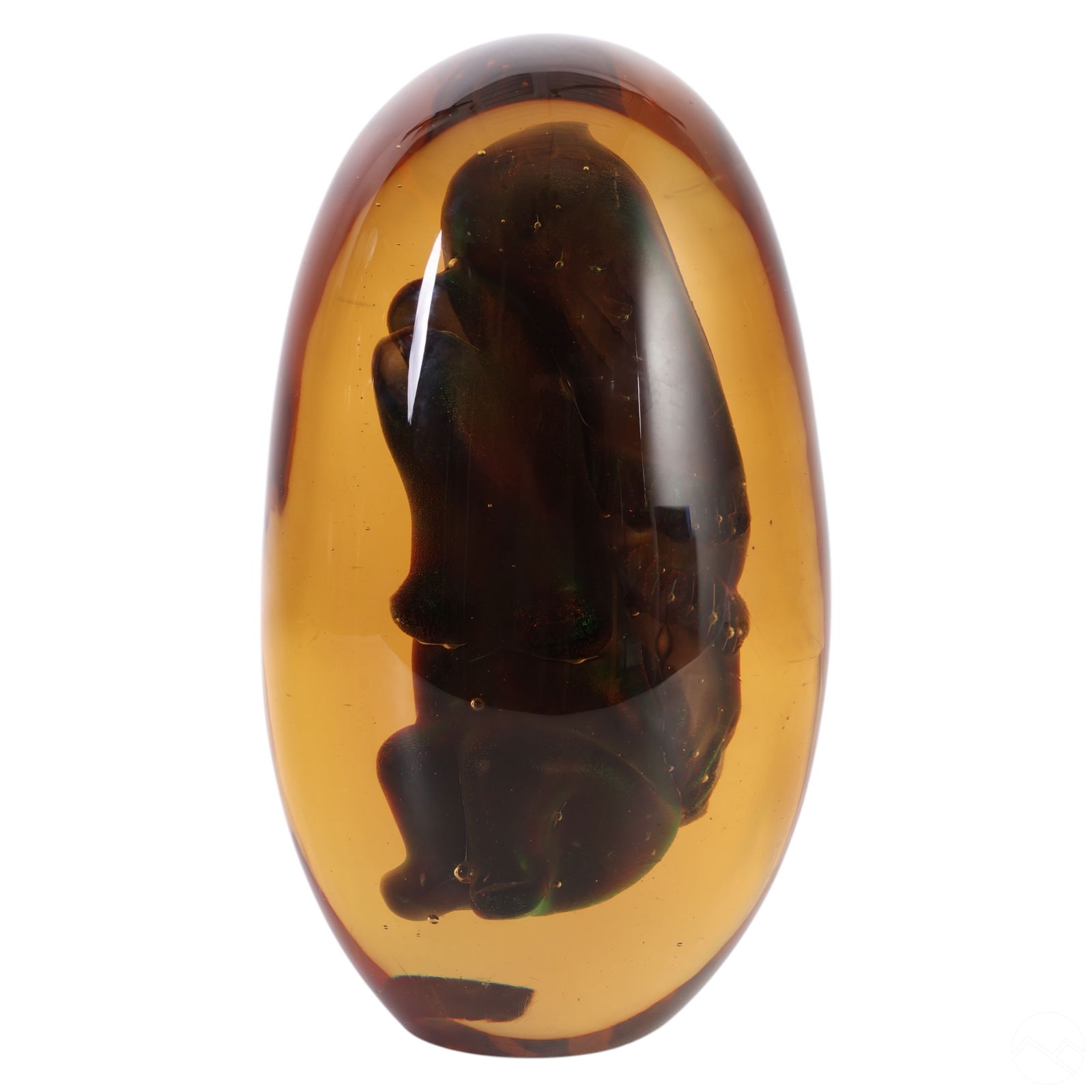 Livio Seguso 1930-2009 Murano Art Glass Sculpture: Livio Seguso (Italian, 1930-2009), studio art glass sculpture featuring a substantial oval form executed in emerald green with suspended internal abstract elements accented in coppery-red. The design