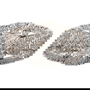 14k Gold Art Deco Diamond Embellished Brooch 8.5g: 14K white gold Art Deco brooch featuring an openwork geometric design set with round-cut diamonds. The center diamond measures approximately 4mm, with four additional diamonds measuring approximately