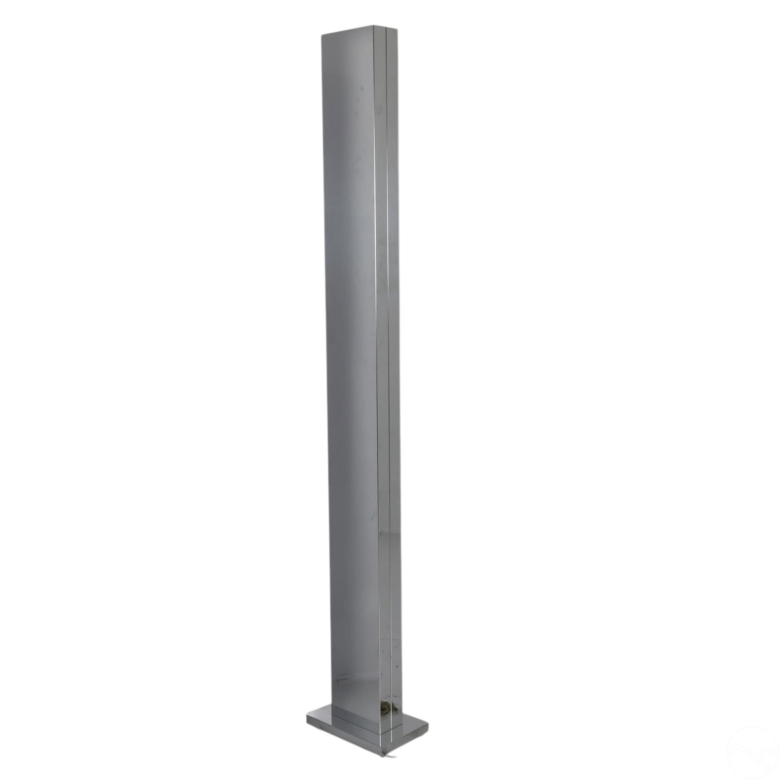 Kovacs for Casella Tall Chrome Monolith Floor Lamp: George Kovacs for Casella chrome-plated Monolith torchiere floor lamp. The tall, columnar skyscraper form features a mirrored chrome surface with bold geometric lines, designed to cast ambient light u