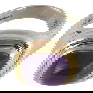 Sterling 18K Paloma Picasso for Tiffany Ring 10.3g: Paloma Picasso for Tiffany & Co. sterling silver and 18k yellow gold amethyst ring. Featuring a bezel-set cabochon amethyst measuring approximately 10 x 11.5 mm. Interior signed "Paloma Picasso Tiffan
