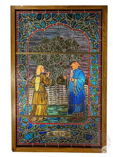 French Medieval Style Spring Stained Glass Window: Vintage leaded stained art glass window panel depicting a Renaissance-style springtime scene with a robed male and female figure beneath a flowering tree. The frame features blue and green stained gla