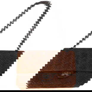 Chanel Brown Quilted Leather Reissue 2.55 Bag: Classic Chanel Reissue 2.55 flap shoulder bag crafted in brown aged calfskin leather with signature diamond quilting. Features include the iconic mademoiselle turn-lock closure, double flap design, an
