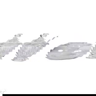 Baccarat Crystal Condiment Jars and Caviar Server: Baccarat crystal serving pieces including two lidded condiment jars and one round two-piece caviar serving bowl. The condiment jars feature hexagonal bases, faceted domed lids with spherical finials,
